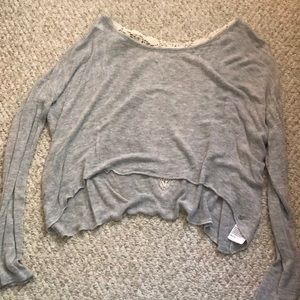 Cropped light sweater